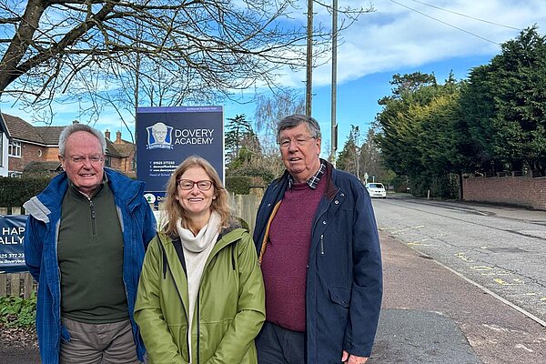 Councillors Bligh, Kidd and Carnell stand in front of Dovery Academy